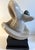 A delightful modern abstract polished marble stone sculpture. The work is well executed and is mounted on a rotating base...