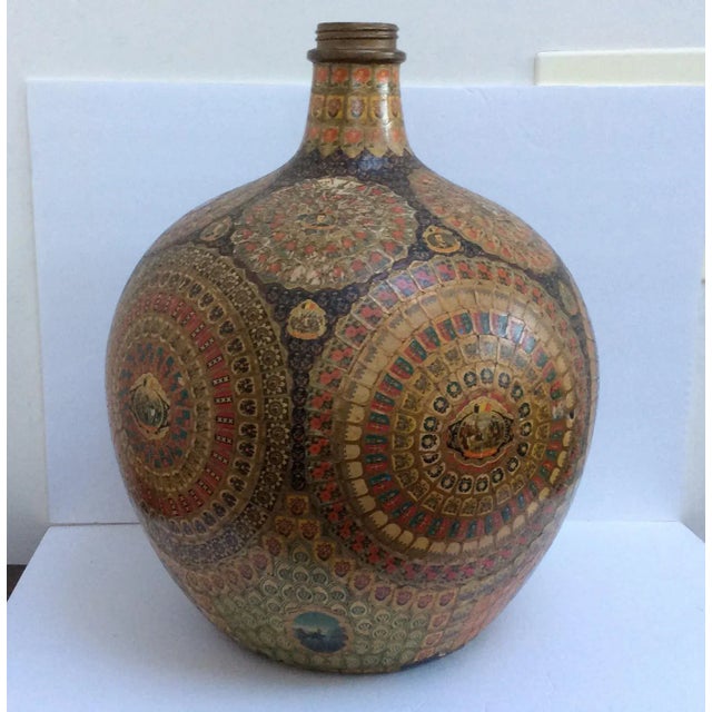 Amazing large antique French wine bottle covered in cigar labels with wonderful Antique graphics. This type of tobacco...