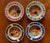 Set of four vintage Mid-Century Modern art mosaic tile coasters from Japan, measuring 3.75 inches in diameter. These round...