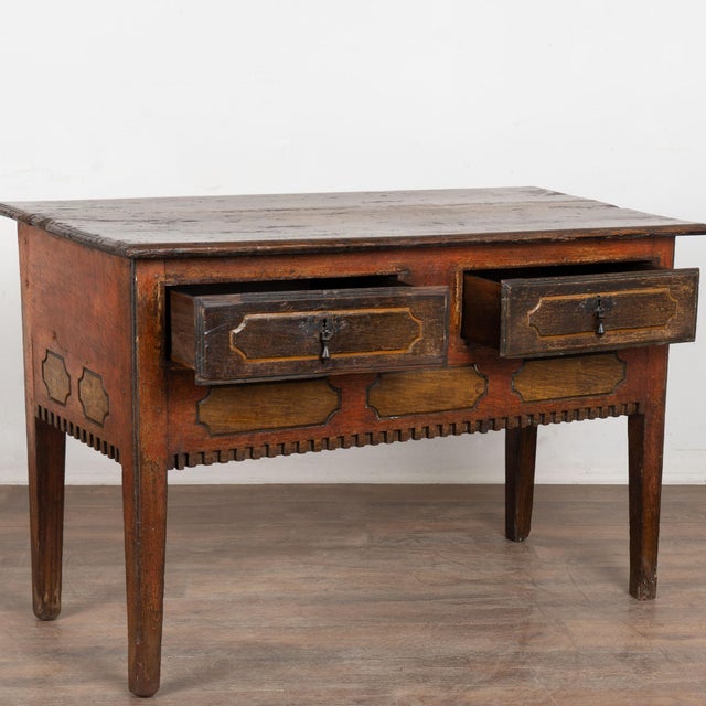 Early 19th century Portuguese side or console table crafted in oak and retaining its original painted finish in tones of...