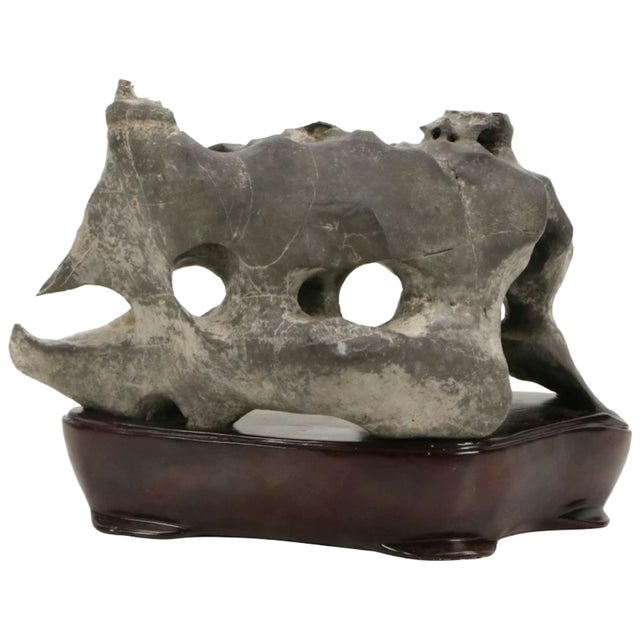This one-of-a-kind Chinese scholar stone (Gongshi) brings a quiet sense of wonder to any space. Naturally shaped over...