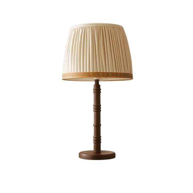 Lily table lamp in wood with cotton pleated shade by popus editions. Dimensions: ø 30 x h 69 cm. Materials: brushed oak or...