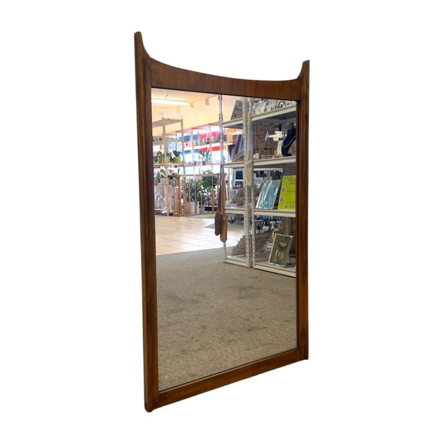 Enhance your home with this authentic mid-century modern wall-mount mirror, crafted from high-quality walnut with the...