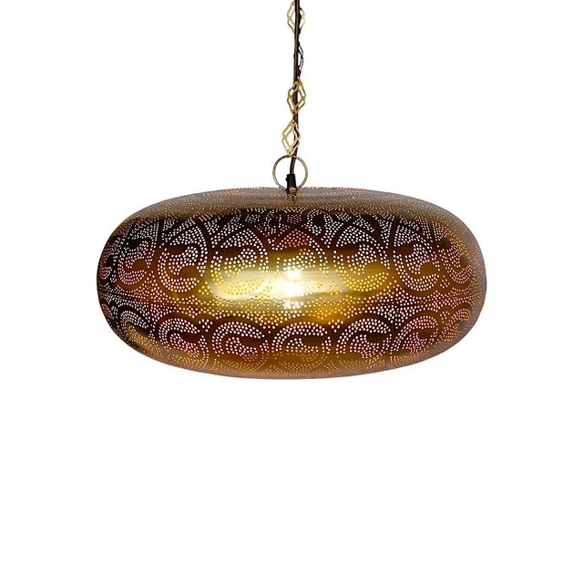 Elevate your space with this exquisite handcrafted brass Moroccan pendant light, designed to bring warmth and...