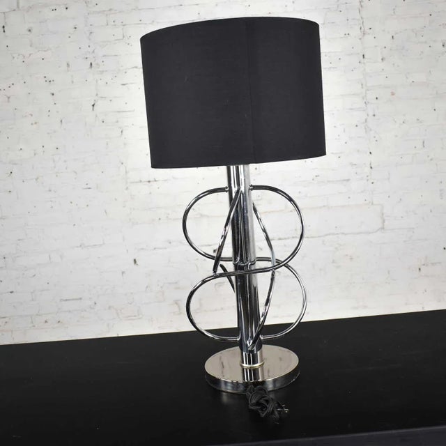 Striking vintage mid-century modern polished chrome table lamp with new black Fenchel drum shade. Wonderful condition...