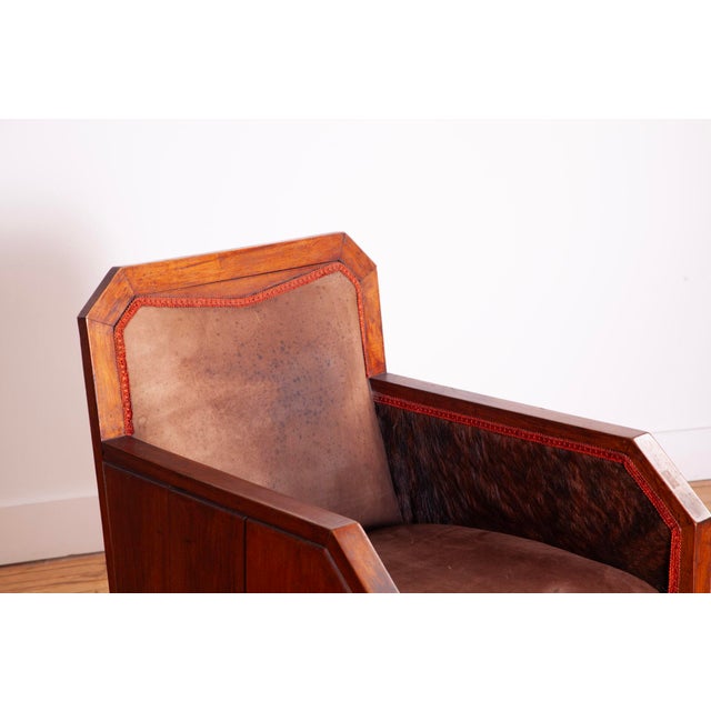 An absolutely astonishing and rare pair of 1920s French Cubist chairs. Features wrap-around oak paneling and original...