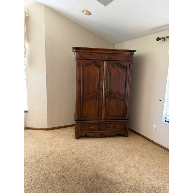 Provenance & Condition Offered by the original owner, this majestic, heirloom-quality audio media armoire is a stellar...