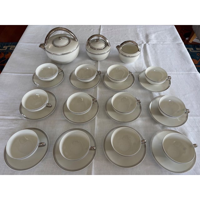 Magnificent Limoges fine porcelain tea service signed Charles Ahrenfeldt, a testament to the excellence of this renowned...
