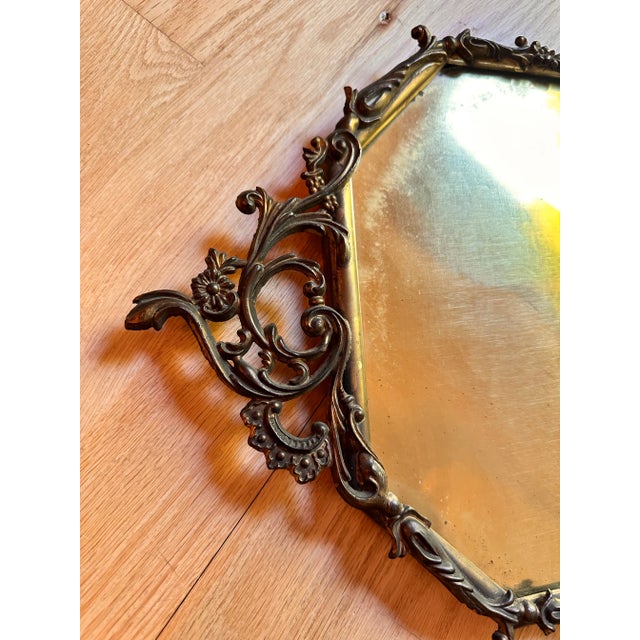 Rectangular antique metal picture frame. Victorian style metal scrollwork. The glass has a slight curve to it. Natural...