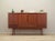 The highboard was made in the 1960s, Danish production. The structure is covered with teak veneer. The legs and handles...