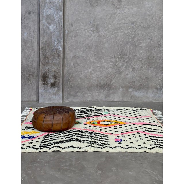 Small Azilal Rug – Handmade Moroccan Neon Berber Wool Rug This handmade small Azilal rug is a vibrant piece of Moroccan...