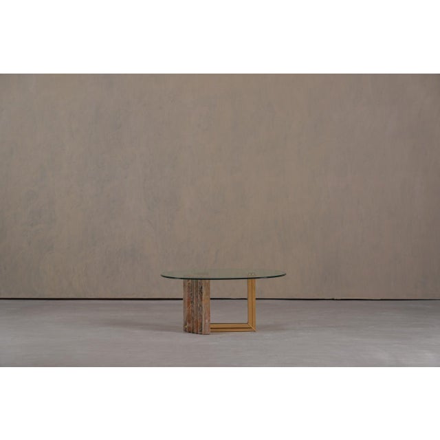 This elegant coffee table was produced by Italo Valenti in Italy during the 1970's and showcases the refined materials and...