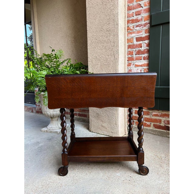 Antique English Tea Trolley Drinks Cart Barley Twist Dumbwaiter Drop Leaf Table. Direct from England, a beautiful antique...