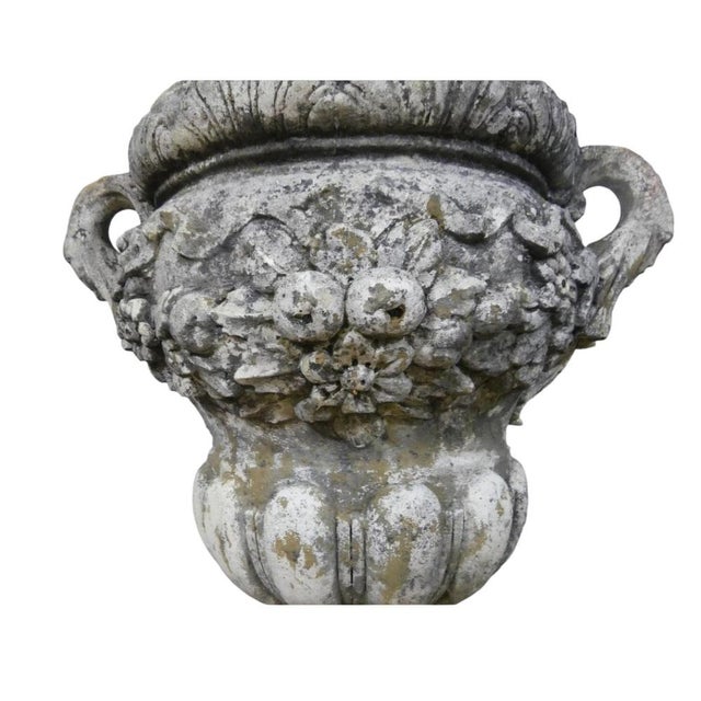 Discover a touch of elegance and history with our stunning Pair of Stone Vases on Pedestals from the 20th Century. These...