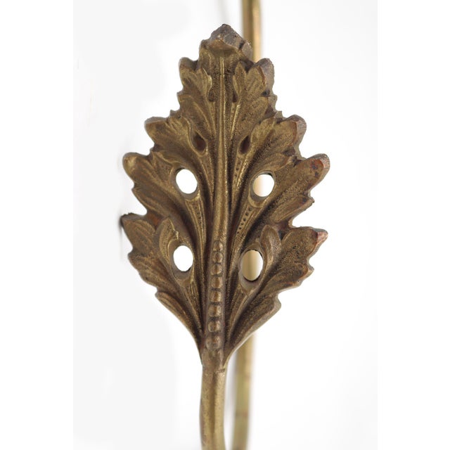 French style curtain tieback made of brass. The original mounting screws are not available. Good condition with surface...