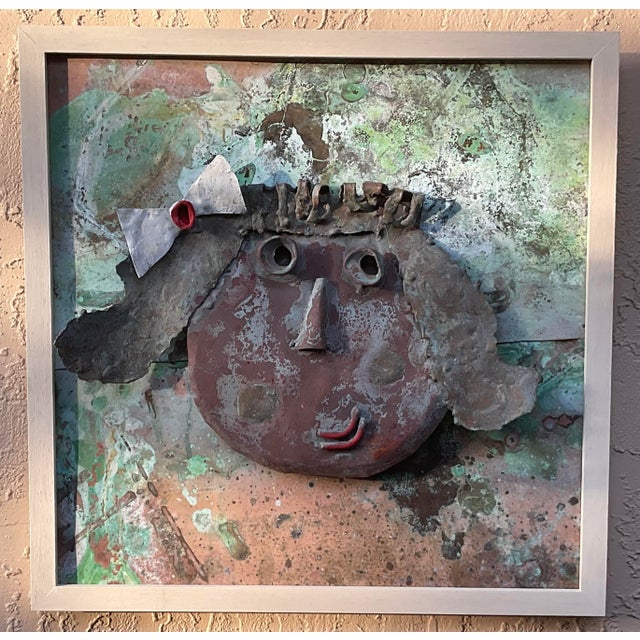 Introduce a captivating piece of tactile, modern folklore into your collection. This unique, framed 3D mixed-media relief...