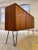 This teak sideboard from rt Möbel is a classic example of West German mid-century furniture design. The frame impresses...