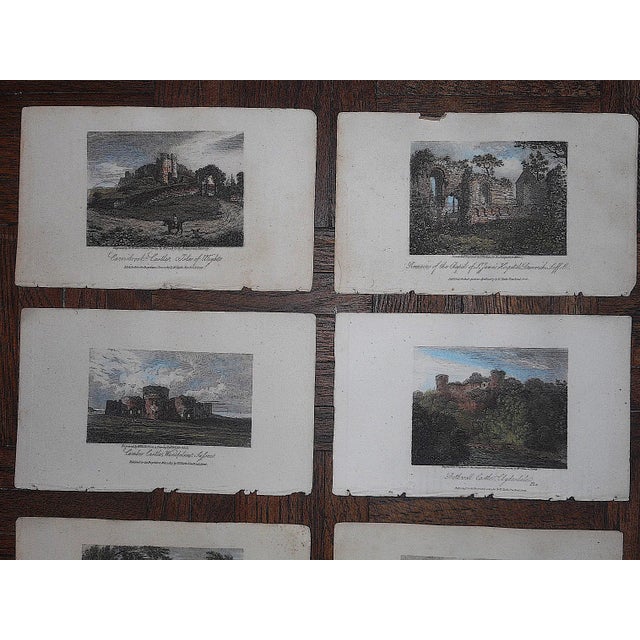 This set of twelve (12) diminutive authentic early 19th century hand colored engravings depict various locations...