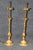 This pair of gilt doré bronze Belle Époque style table lamps, attributed to the legendary Maison Jansen, embodies the...