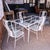 Set of four Salterini “Montego” dining chairs featuring the iconic pinwheel back design associated with the line. The...
