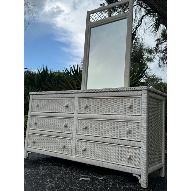A timeless classic from Henry Link, this vintage wicker dresser and matching mirror embody the effortless elegance of Palm...