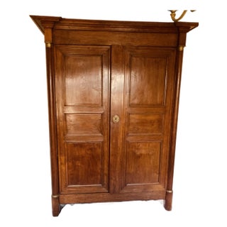 Antique French Empire Armoire Walnut, Columns to Either Side Front With Bronze Gilt Mounts Also Gilt Bronze Key Hole For Sale