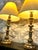 A pair of 1920s Spanish-style candlestick lamps with 43 individual mirror insets. Measurements: Overall Height: 34.5"H...