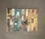 An original mixed-media collage composed of carefully arranged paper fragments in a sophisticated palette of warm ochre,...