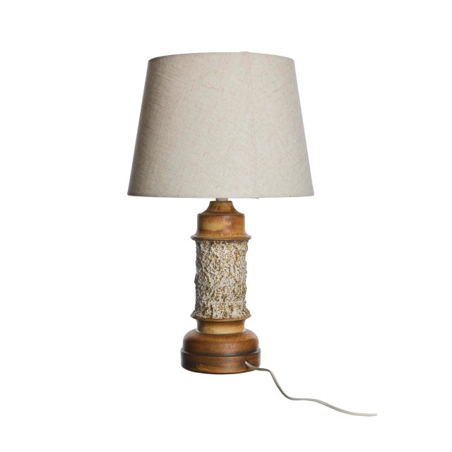 This Bruno Karlsson Table Lamp, originating from Sweden in the 1960s, embodies the quintessential charm and sophistication...