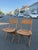 Teakwood and weaved rope folding chairs in the style of Hans Wegner. The chairs are made in Yugoslavia. H: 31.75” W: 17”...