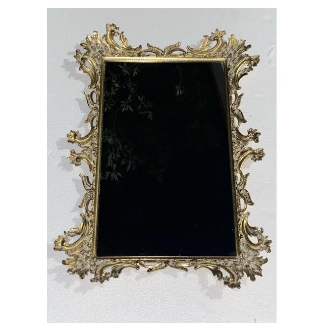 Minor scratch on mirror that’s subtle Stunning Less than 1” break away on a portion of the metal , please see image Felt...