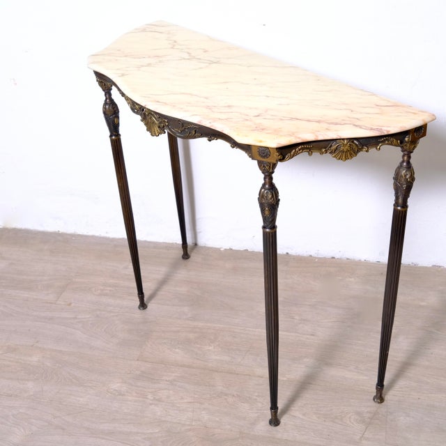 Beautiful bronze and marble console table, Italy, 1950s/60s, removable shelf. Dimensions: Height 80 cm Width 95 cm Maximum...