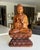 Well crafted Asian hand carved wood statue of Gautama Buddha resting on a stylized lotus pedestal. Also known as...