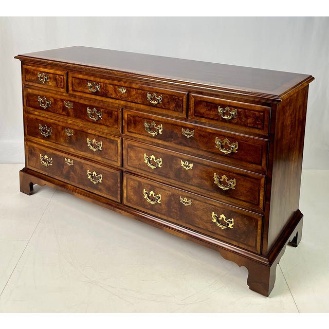 An exceptional English-style double dresser crafted by Henredon Fine Furniture from the prestigious Aston Court...