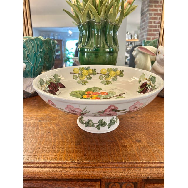 This large pedestal ceramic compote is from Portmeirion in the Pomona Fruit pattern. It is a piece that is so versatile…a...