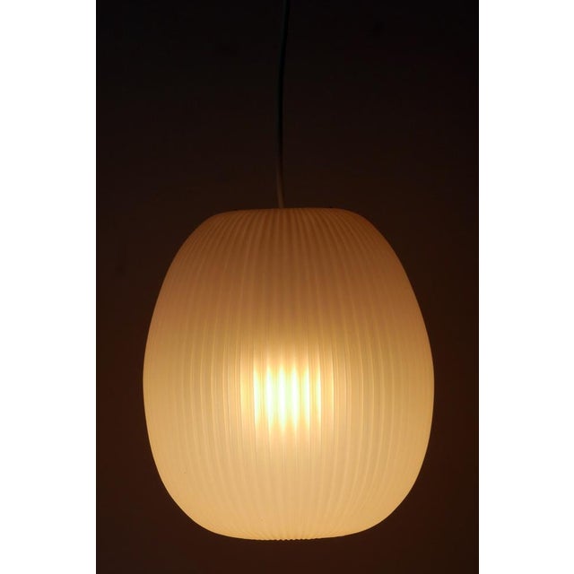 Lovely mid-century modern pendant lamp or hanging light. Designed by aloys f. Gangkofner for erco leuchten, germany, 1960....