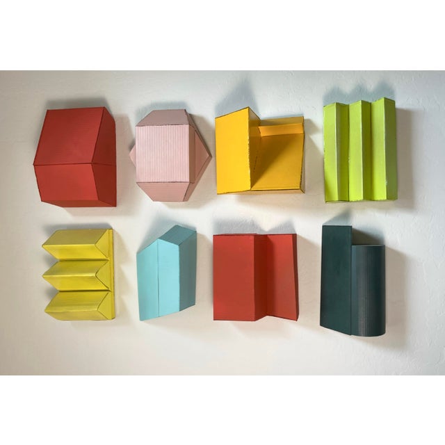 This one-of-a-kind piece is constructed with found cardboard and taxicab yellow spray paint. It offers a 3D minimalist...