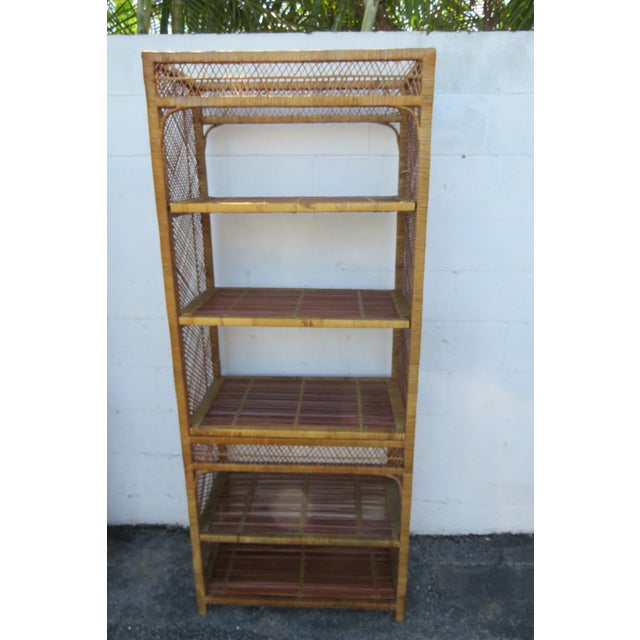 This brilliant Display Shelving is made of Bamboo. This Shelving is an excellent example of Vintage Hollywood Regency...