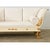 A glamorous Swedish Empire style settee from the early 19th century (circa 1820) its painted wood frame sheltering the...