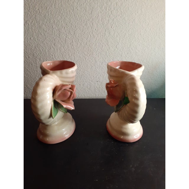 These are GORGEOUS vintage Pair of Porcelain 5" Cornucopia Bud Vases. Procured at auction One leaf has been repaired. It...