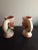 These are GORGEOUS vintage Pair of Porcelain 5" Cornucopia Bud Vases. Procured at auction One leaf has been repaired. It...