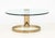 Modern Circular Glass Top Gilt Metal Coffee Table. 16" H x 36" Diameter. Provenance: From a Long Island, New York Estate.