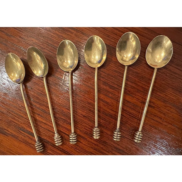 This elegant Art Deco set of antique English espresso demitasse teaspoons featuring an enameled shell pattern on the...