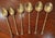 This elegant Art Deco set of antique English espresso demitasse teaspoons featuring an enameled shell pattern on the...