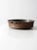 Antique moulded copper braising pan with iron handles and an aged tin lining. Beautifully hammered with a rich, time-worn...