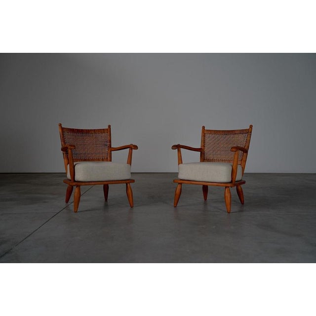 Lounge chairs The chairs are in a very good condition with some traces of usage on the wooden frame. Reupholstered in linen.