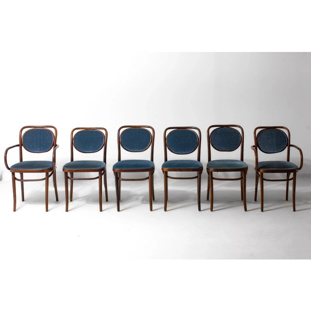 Set of six bentwood dining chairs designed by Josef Hoffmann and produced by Thonet in the 1960s. The set includes four...