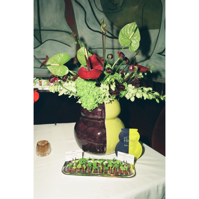 Purple and green vase custom made for Edie Parker by artist Julia Elsas.