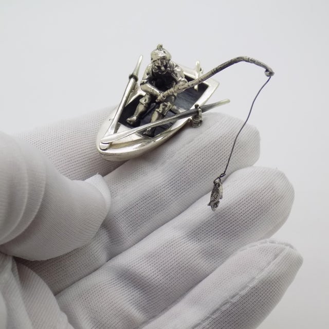 Vintage narrative style sculpture depicting a fisherman with his boat, handcrafted in italy between the 1980s and 1990s in...