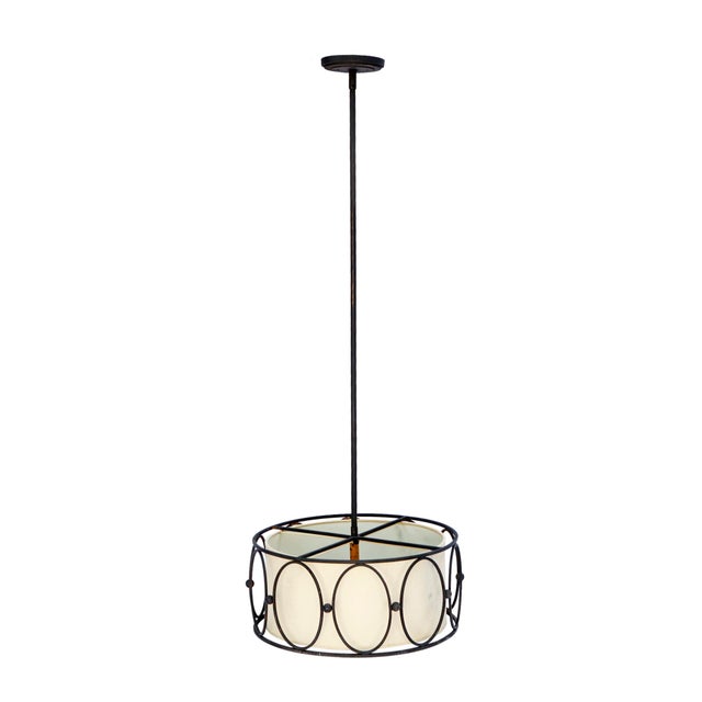 Late 20th century modern fixture, inner shade in painted linen. A hoop & ball design artfully adorn this pendant fixture...